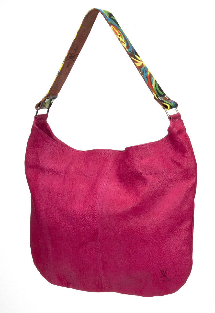 Dimensions: 13” x 16” Liner: Canvas Closure: Magnetic Snap Hardware: Nickel -One 7” zippered pocket inside -Two lined pockets inside -Two lined pockets outside